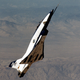 An X-31 flown by German test pilot Karl-Heinz Lang pulls the nose up nearly perpendicular to the flight path while performing the Herbst maneuver, or J-turn. With thrust vectoring, this move allows the fighter pilot to reverse direction significantly faster than possible in a traditional fighter jet. (NASA)